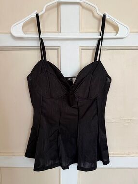 Black going out top